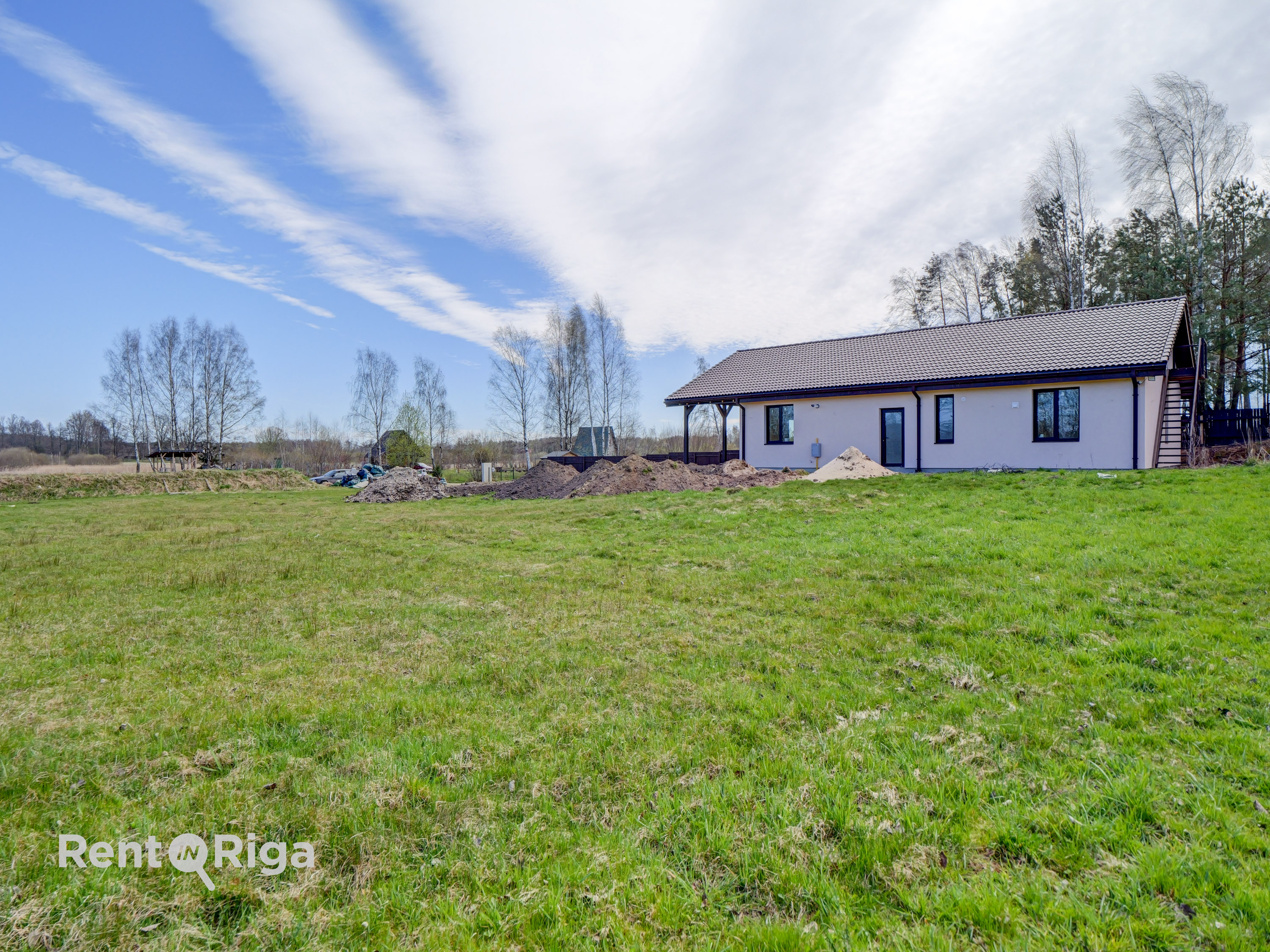 Izīrē māju, Jaunaustras iela - Attēls 1