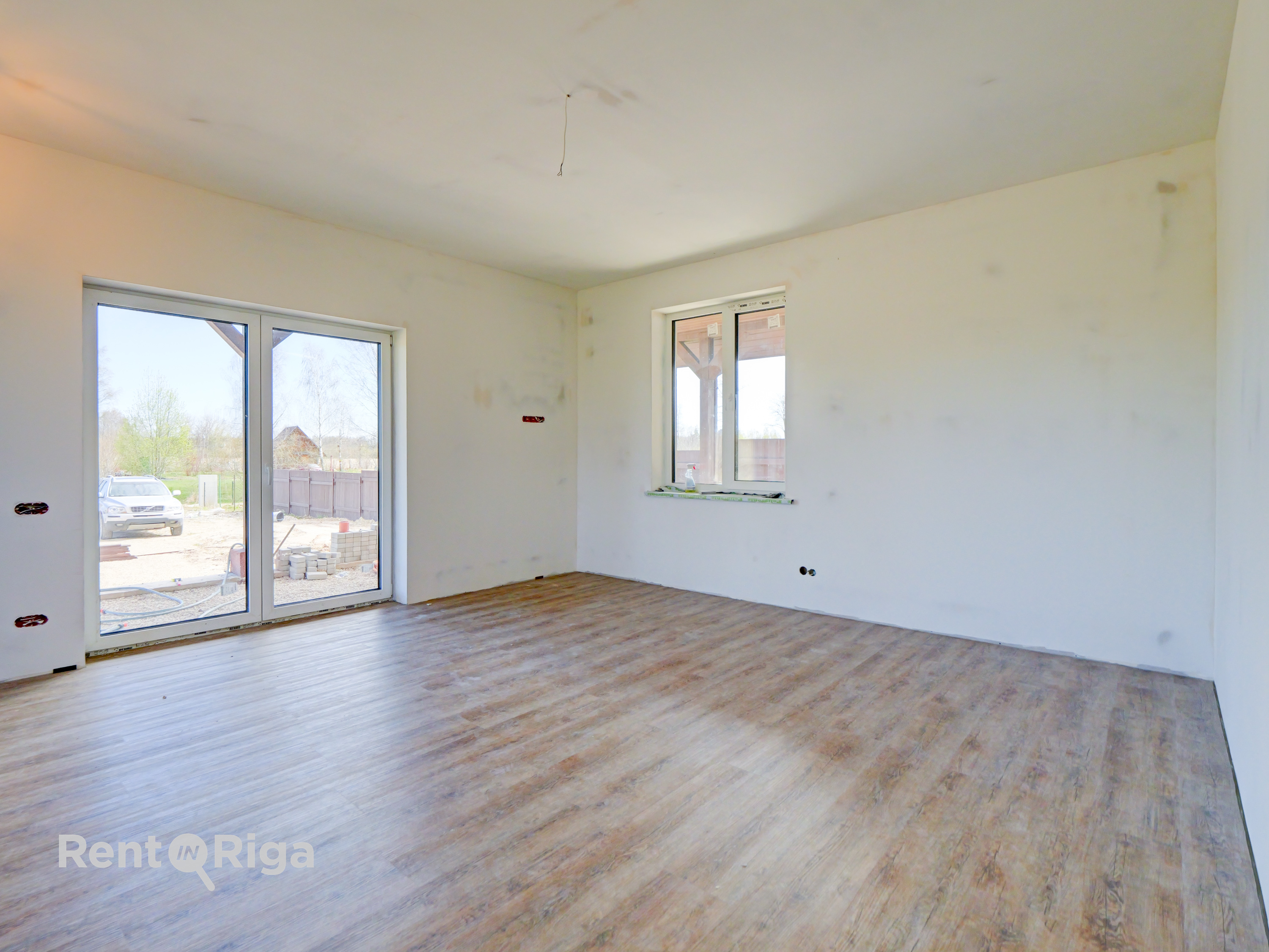 Izīrē māju, Jaunaustras iela - Attēls 1